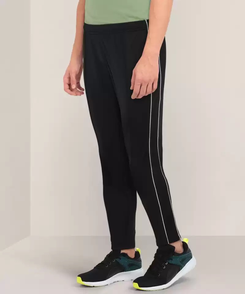 NIKE  Solid Men Track Pants