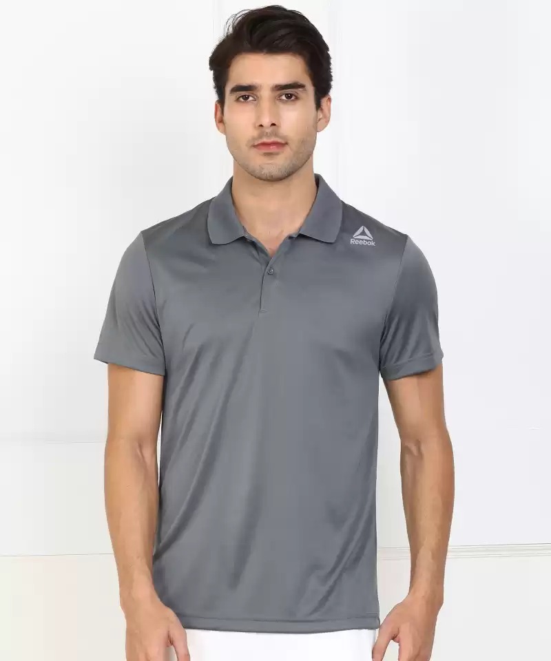 REEBOK  Solid Men Polo Neck T-Shirt