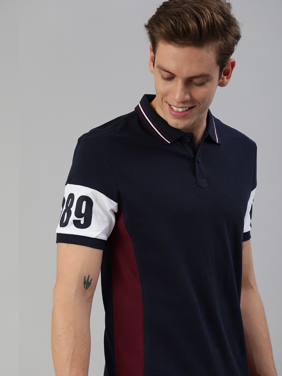 HERE&NOW Men Solid Polo Collar Pure Cotton T-shirt With Printed Detailing